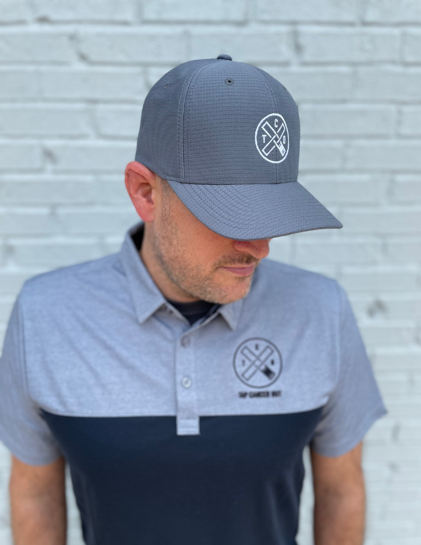 Tap Cancer Out x TravisMathews Golf Polo