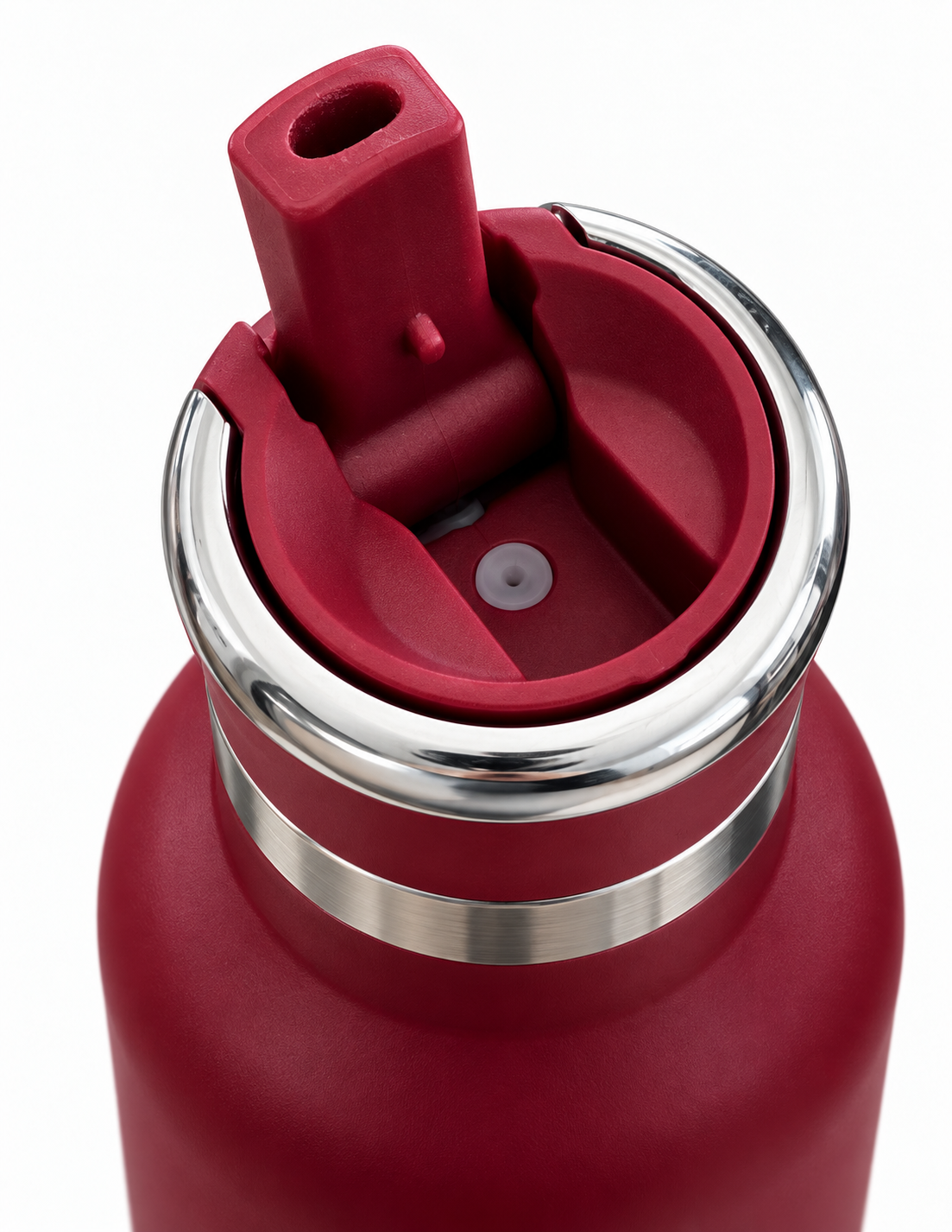 Close-up of a matte red insulated water bottle showing the lid and straw assembly with a polished stainless steel rim on a white background.