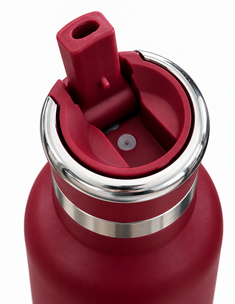 Close-up of a matte red insulated water bottle showing the lid and straw assembly with a polished stainless steel rim on a white background.